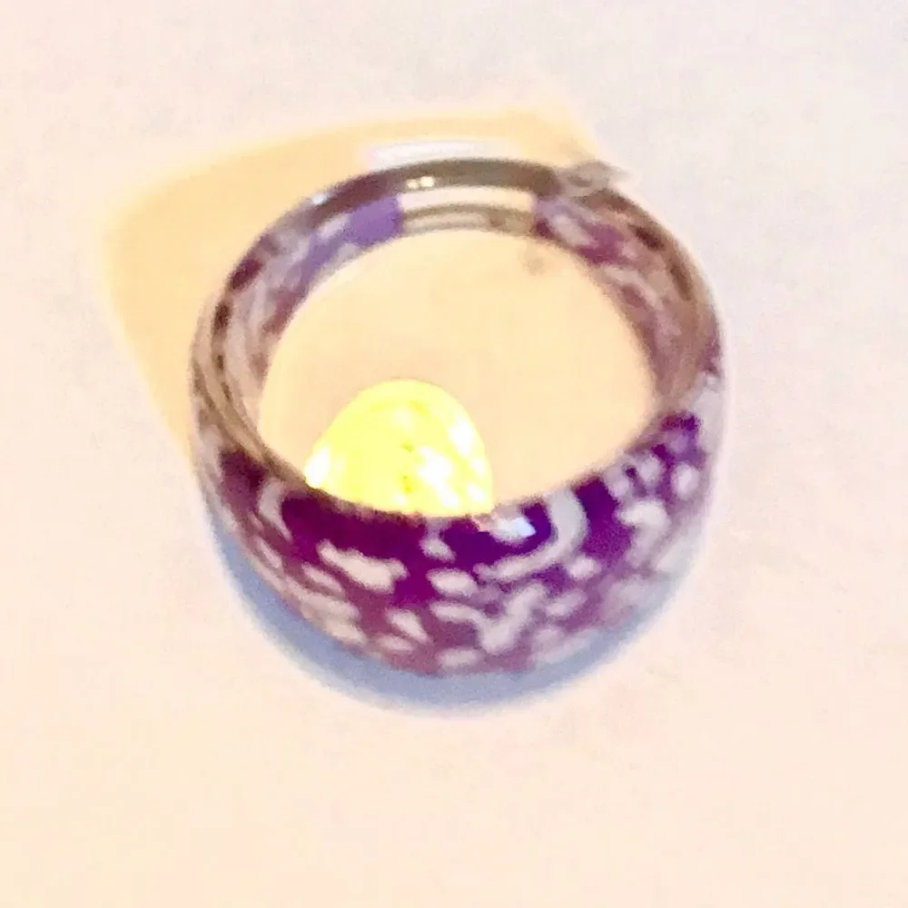 Purple and white ring